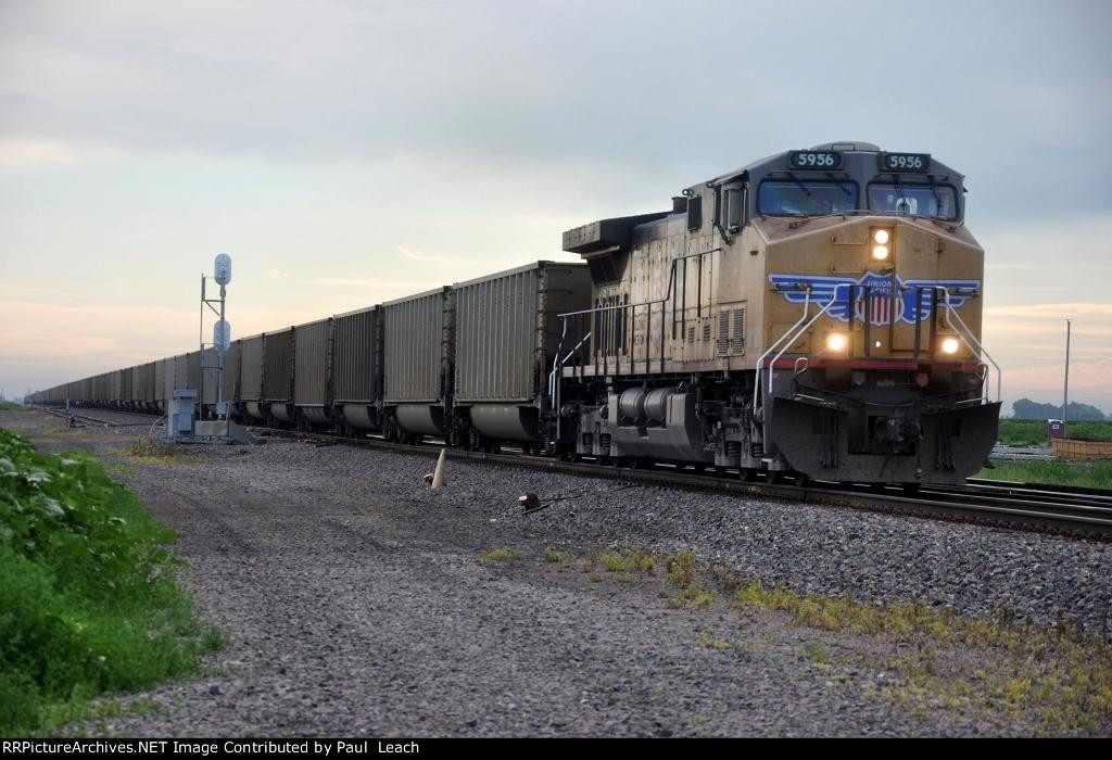 Empty coal train races west